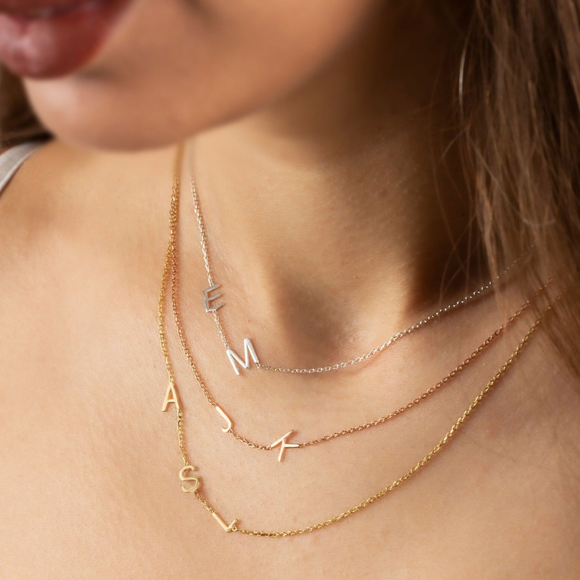 Sideways necklace on sale